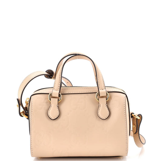 Gucci Convertible Top Handle Bag Jumbo GG Embossed Leather Mini
