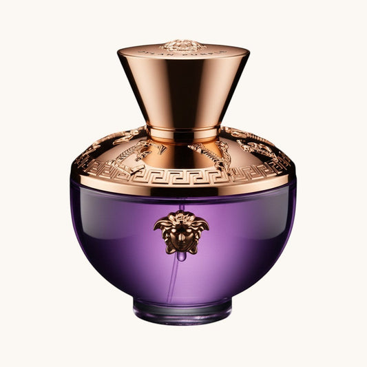 Luxours Dylan Purple Eau de Parfum 100ml, a vibrant, sensual, and feminine fragrance in a rounded purple glass bottle with gold Medusa emblem and rose-gold cap.